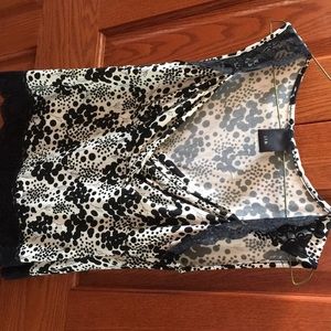 Black and white shirt. Trimmed in black lace.